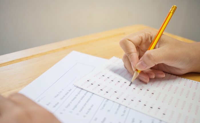 Students,Hands,Taking,Exams,,Writing,Examination,Room,With,Holding,Pencil Students,Hands,Taking,Exams,,Writing,Examination,Room,With,Holding,Pencil